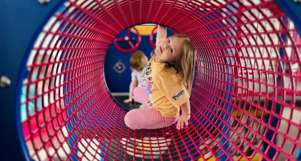 child playing on play equipment at pre k in napa